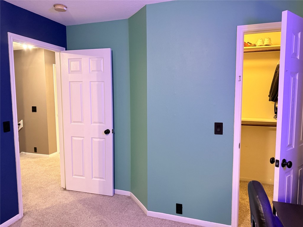 11903 Ezekiel Road Tomball, TX 77375 - Photo 37 of 39 a bathroom with a sink and a mirror