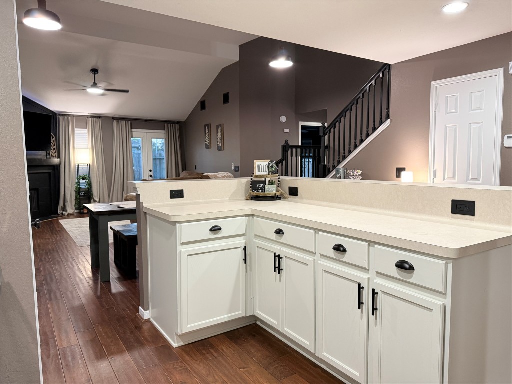 11903 Ezekiel Road Tomball, TX 77375 - Photo 8 of 39 a kitchen with granite countertop white cabinets and white appliances