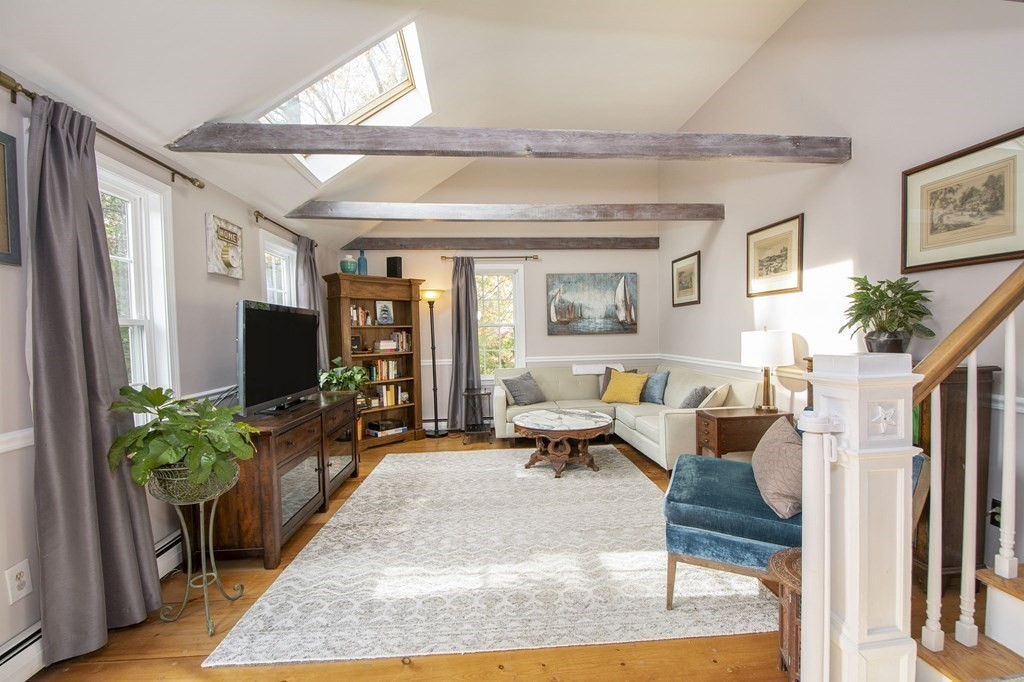 32 Shadwell Road Scituate, MA 02066 - Photo 14 of 32 a living room with patio furniture and a flat screen tv