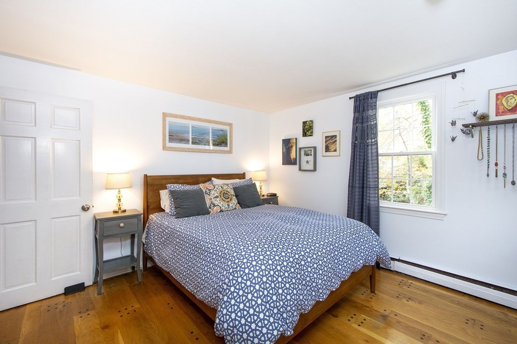 32 Shadwell Road Scituate, MA 02066 - Photo 17 of 32 a bedroom with a bed and window