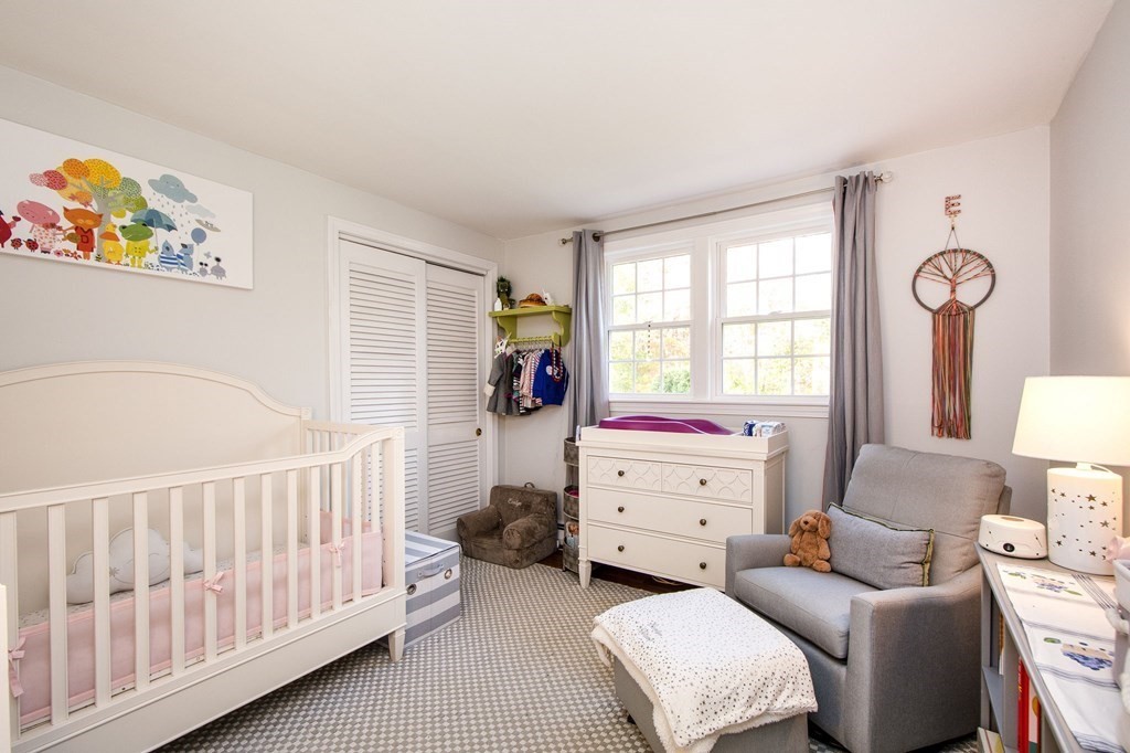 32 Shadwell Road Scituate, MA 02066 - Photo 20 of 32 a bedroom with a bed and a dresser