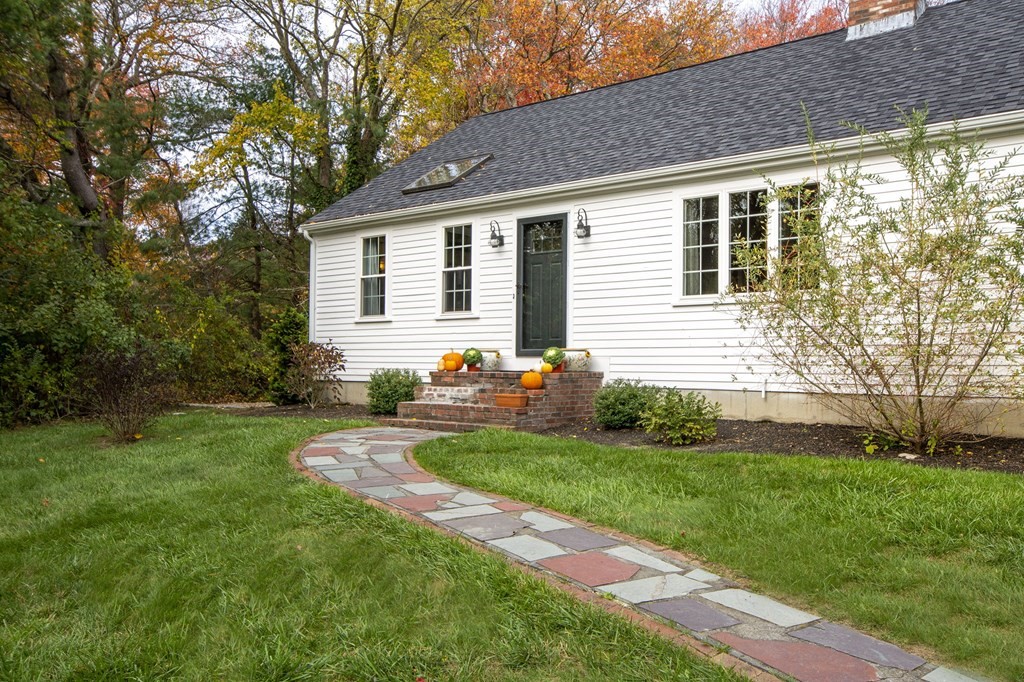32 Shadwell Road Scituate, MA 02066 - Photo 2 of 32 a front view of house with yard and green space
