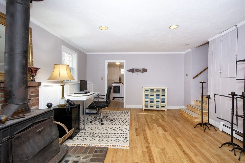 32 Shadwell Road Scituate, MA 02066 - Photo 26 of 32 a living room with furniture and a table