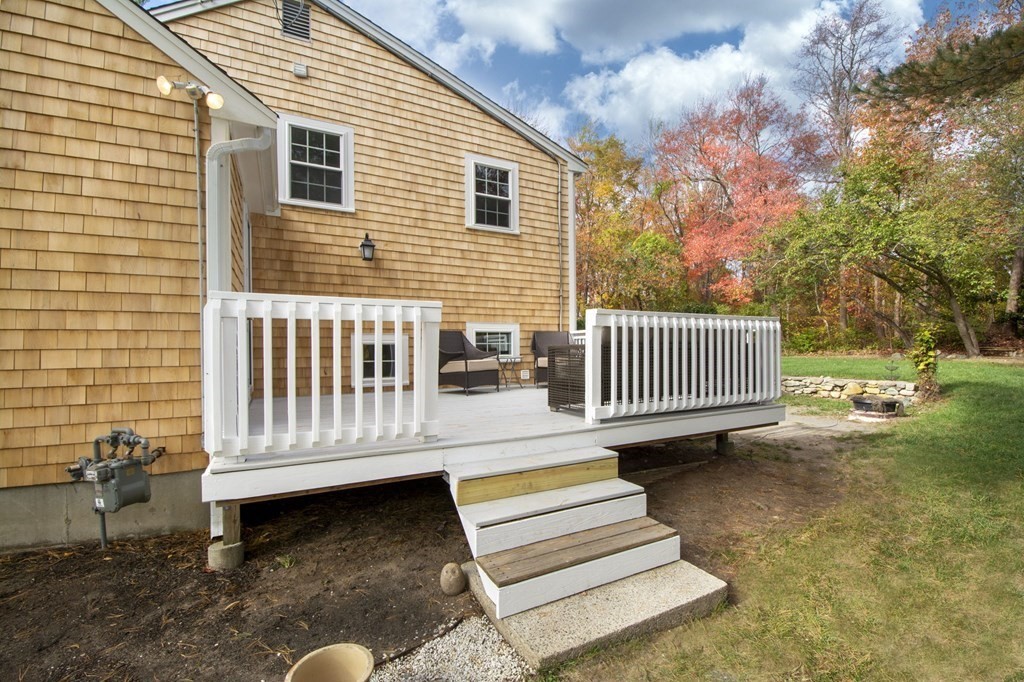 32 Shadwell Road Scituate, MA 02066 - Photo 4 of 32 a view of a deck with a bench