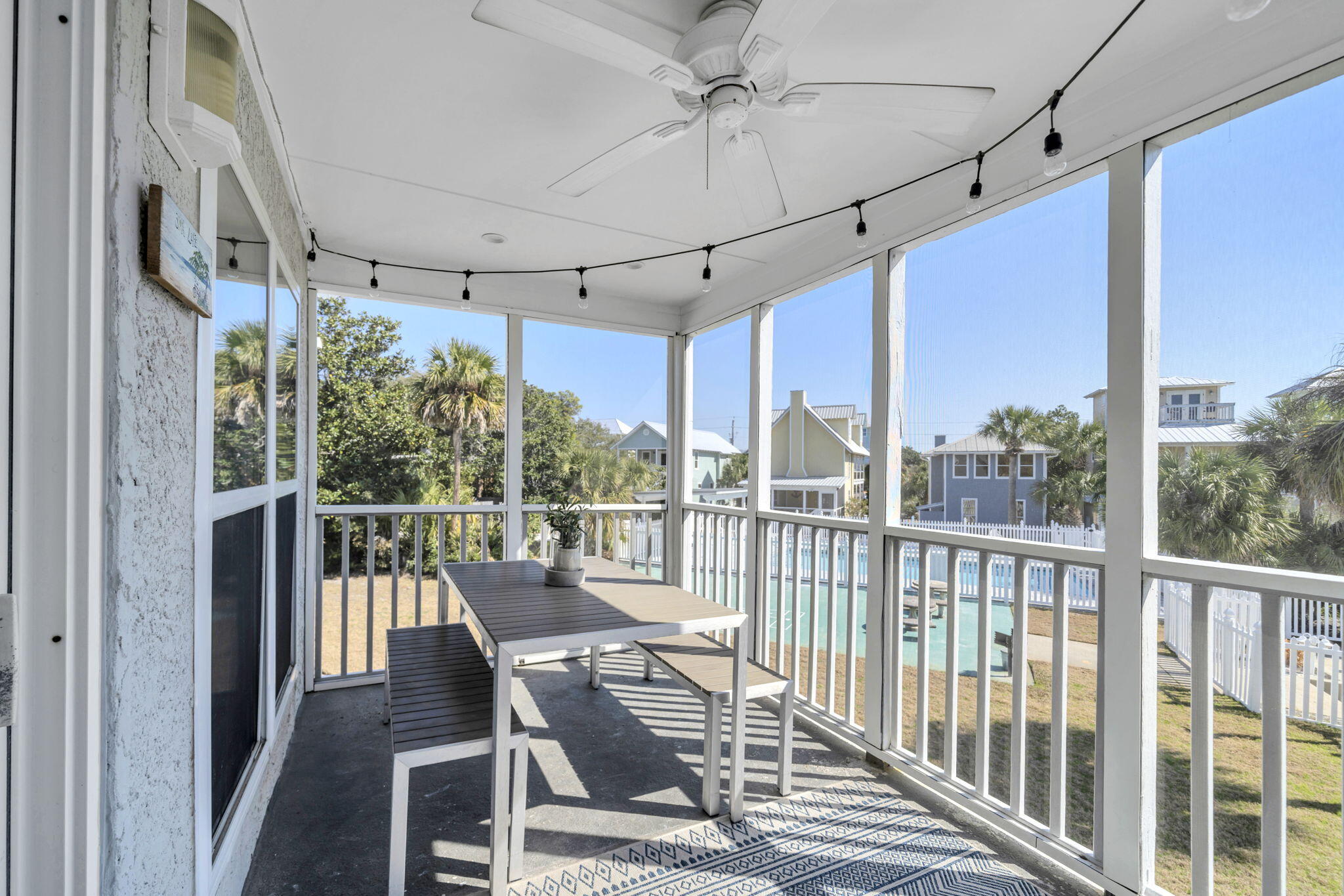4984 West County Highway 30A, Unit 4B Santa Rosa Beach, FL 32459 - Photo 20 of 37 a view of a balcony with chairs