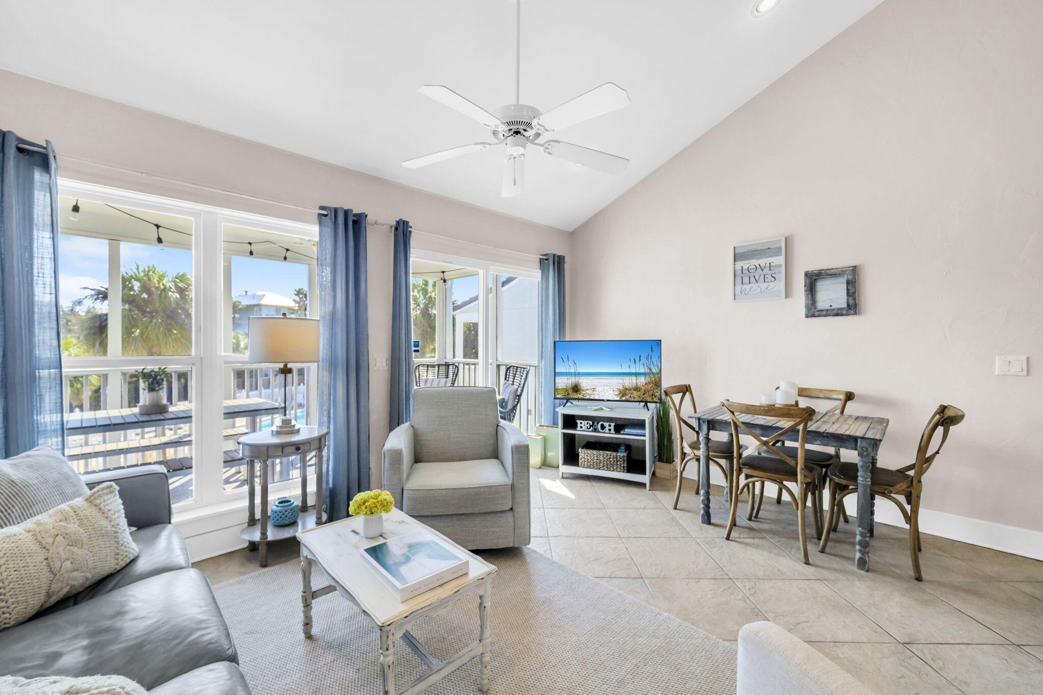 4984 West County Highway 30A, Unit 4B Santa Rosa Beach, FL 32459 - Photo 2 of 37 a living room with furniture and a large window