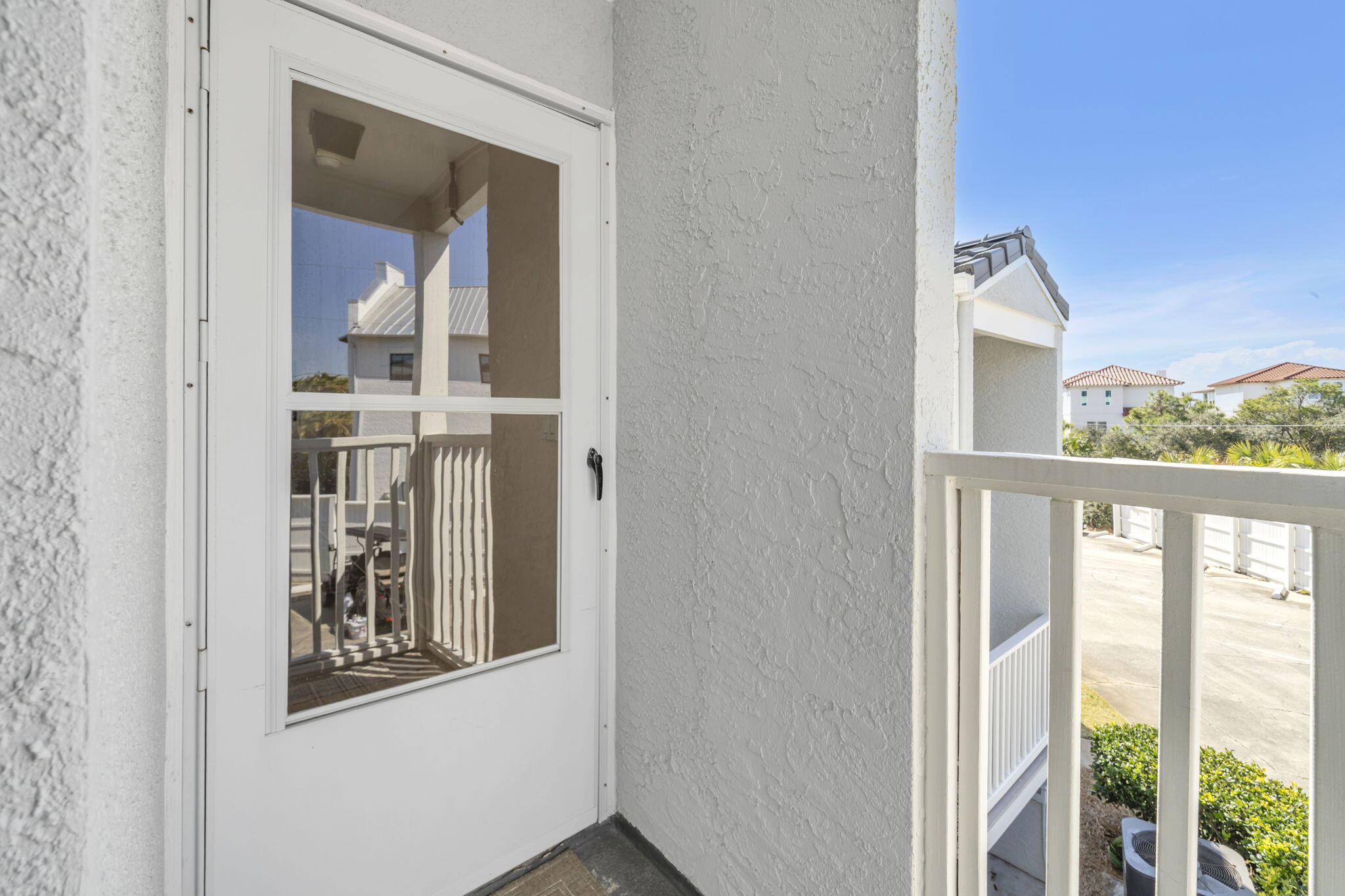 4984 West County Highway 30A, Unit 4B Santa Rosa Beach, FL 32459 - Photo 5 of 37 a view of a hallway with a large window