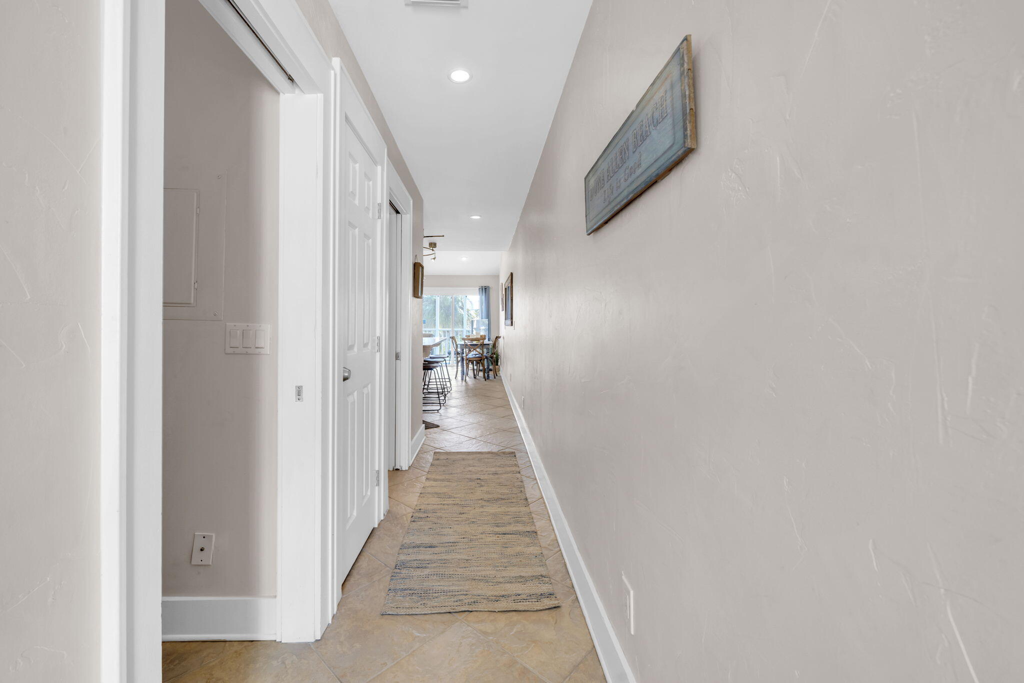 4984 West County Highway 30A, Unit 4B Santa Rosa Beach, FL 32459 - Photo 6 of 37 a view of a hallway with a white walls