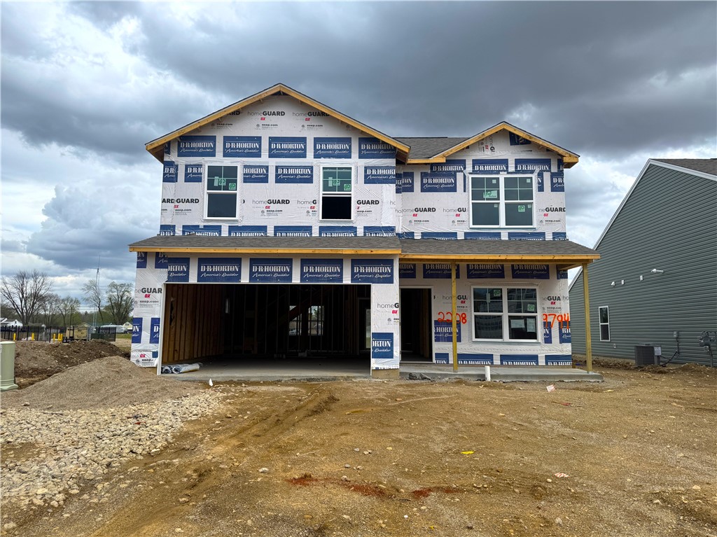 2208 Hackberry Street Springfield, OH 45505 - Photo 1 of 3 This newly constructed residence presents a modern facade with an inviting entryway and expansive windows.