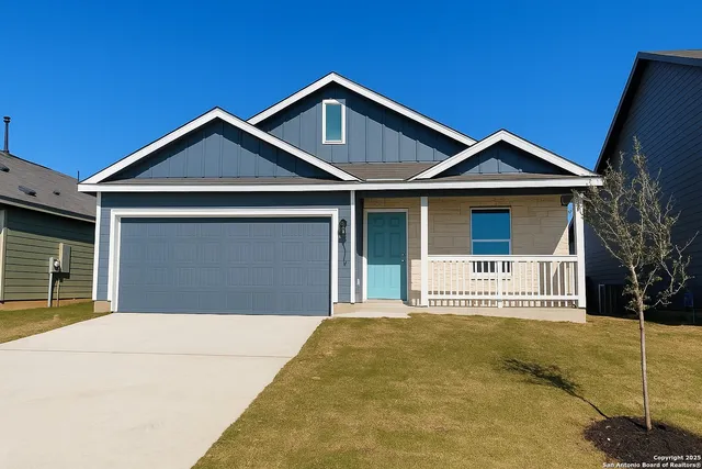 a front view of a house with a outdoor space