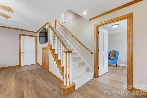 a view of a hallway with staircase