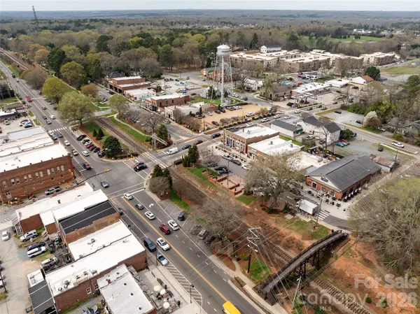 an aerial view of a city with lots of residential buildings