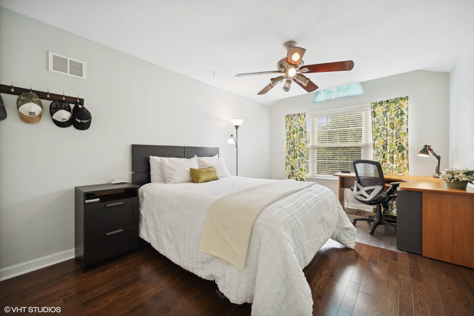 2703 Langley Circle Glenview, IL 60026 - Photo 13 of 23 a bedroom with a bed and wooden floor