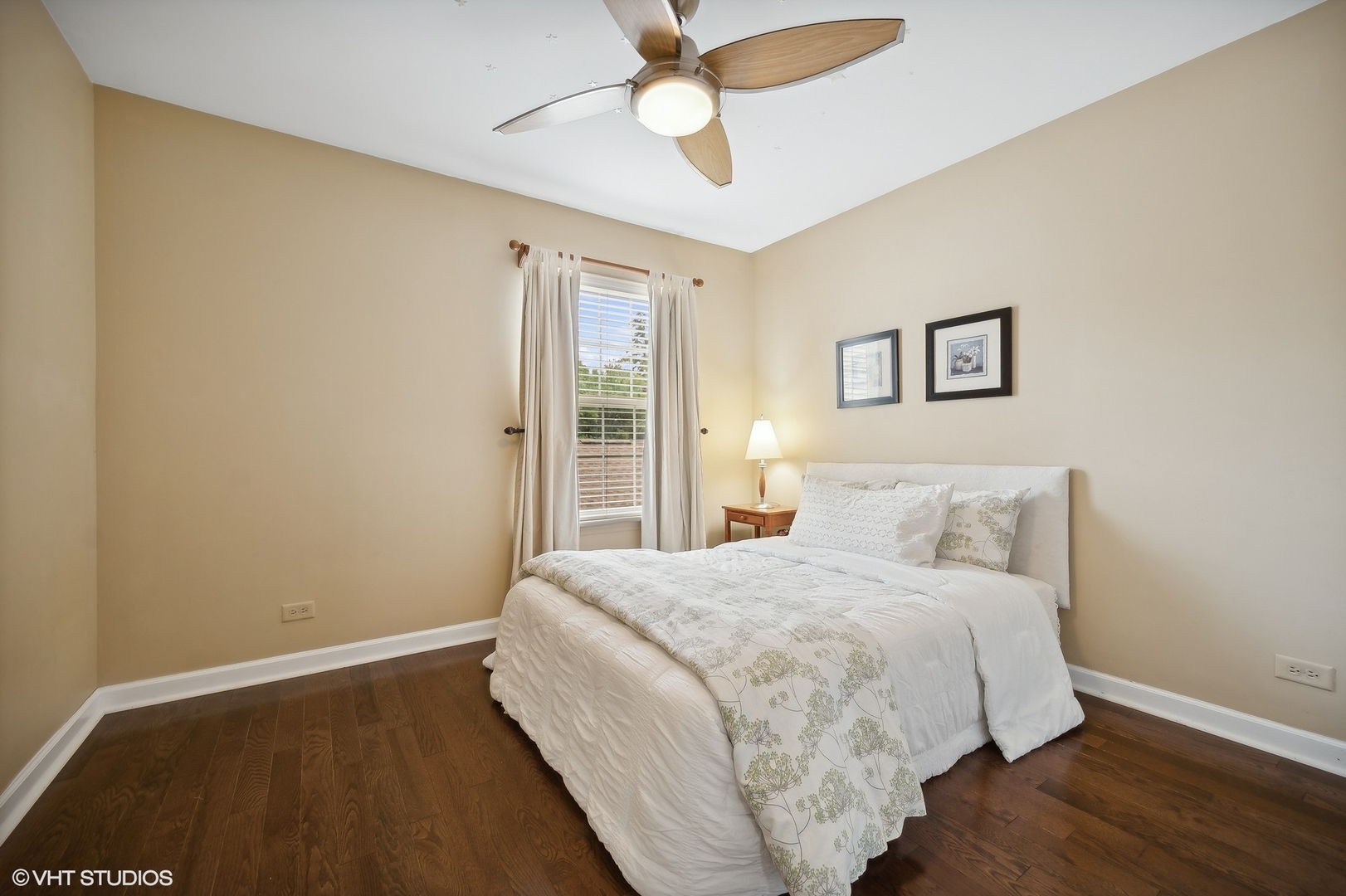 2703 Langley Circle Glenview, IL 60026 - Photo 14 of 23 a bedroom with a bed and a chandelier
