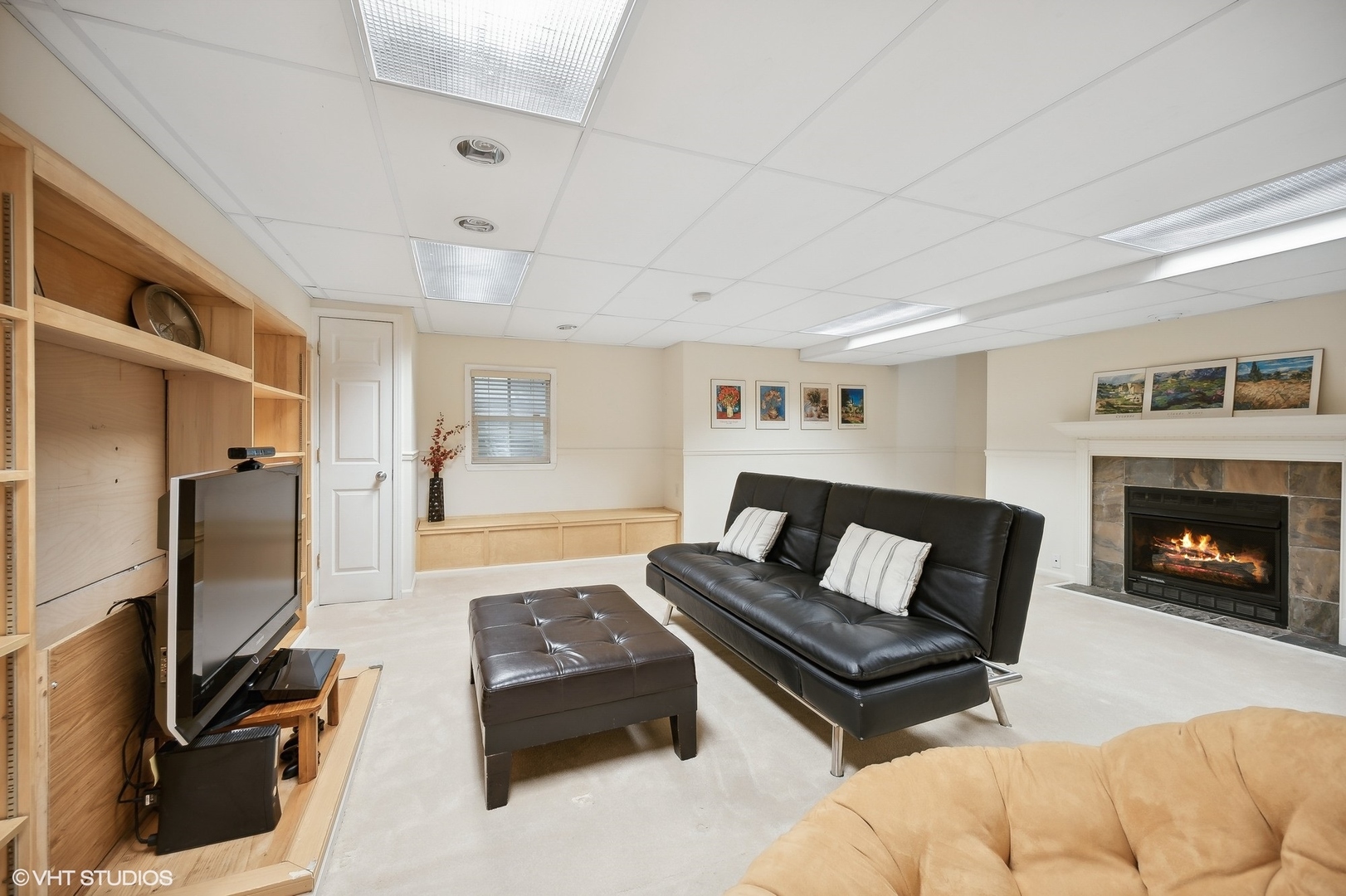 2703 Langley Circle Glenview, IL 60026 - Photo 17 of 23 a living room with furniture flat screen tv and a fireplace