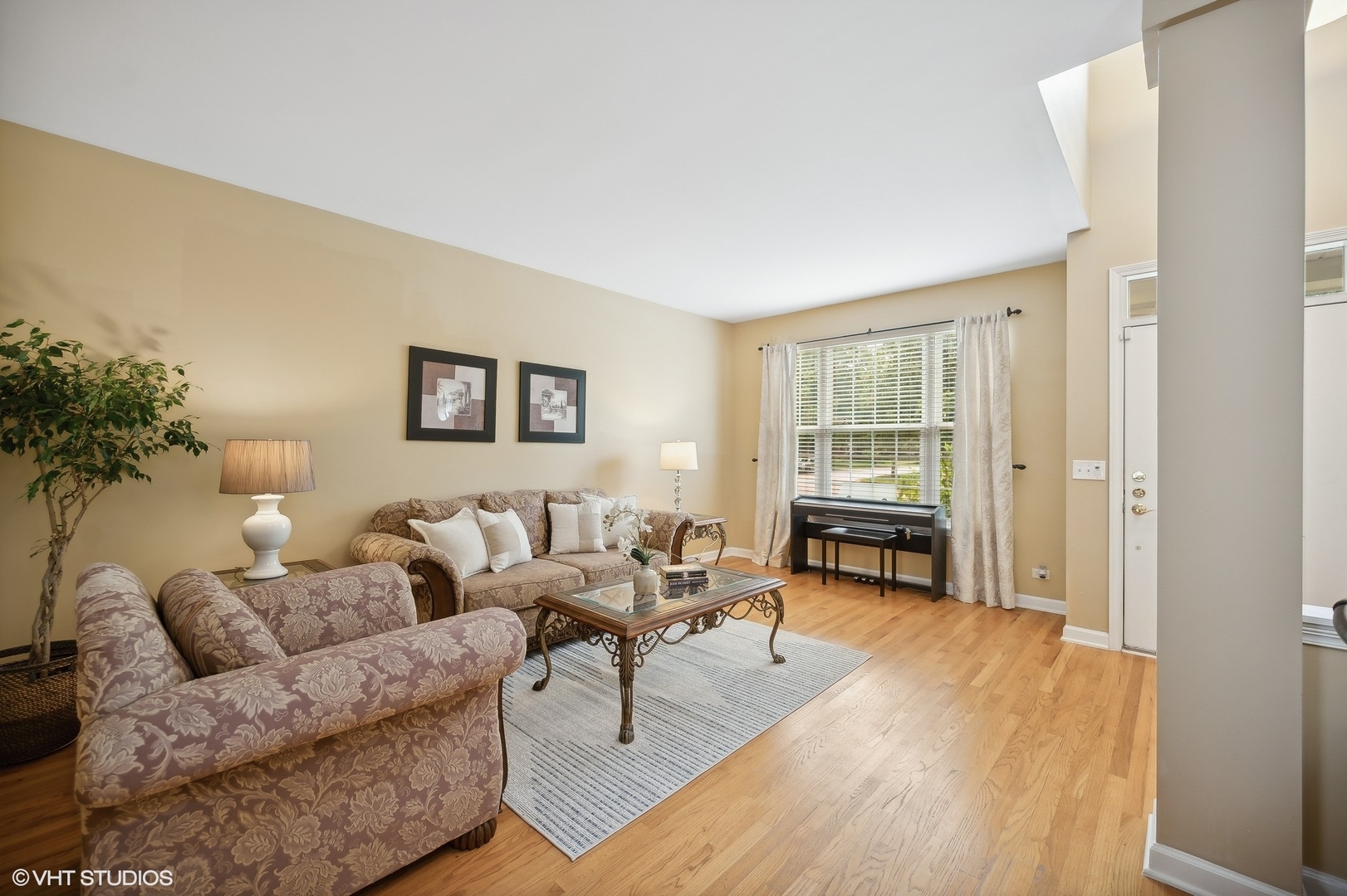 2703 Langley Circle Glenview, IL 60026 - Photo 3 of 23 a living room with furniture and a fireplace