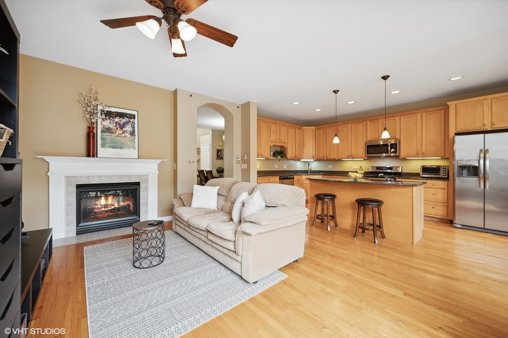 2703 Langley Circle Glenview, IL 60026 - Photo 7 of 23 a living room with furniture and a fireplace
