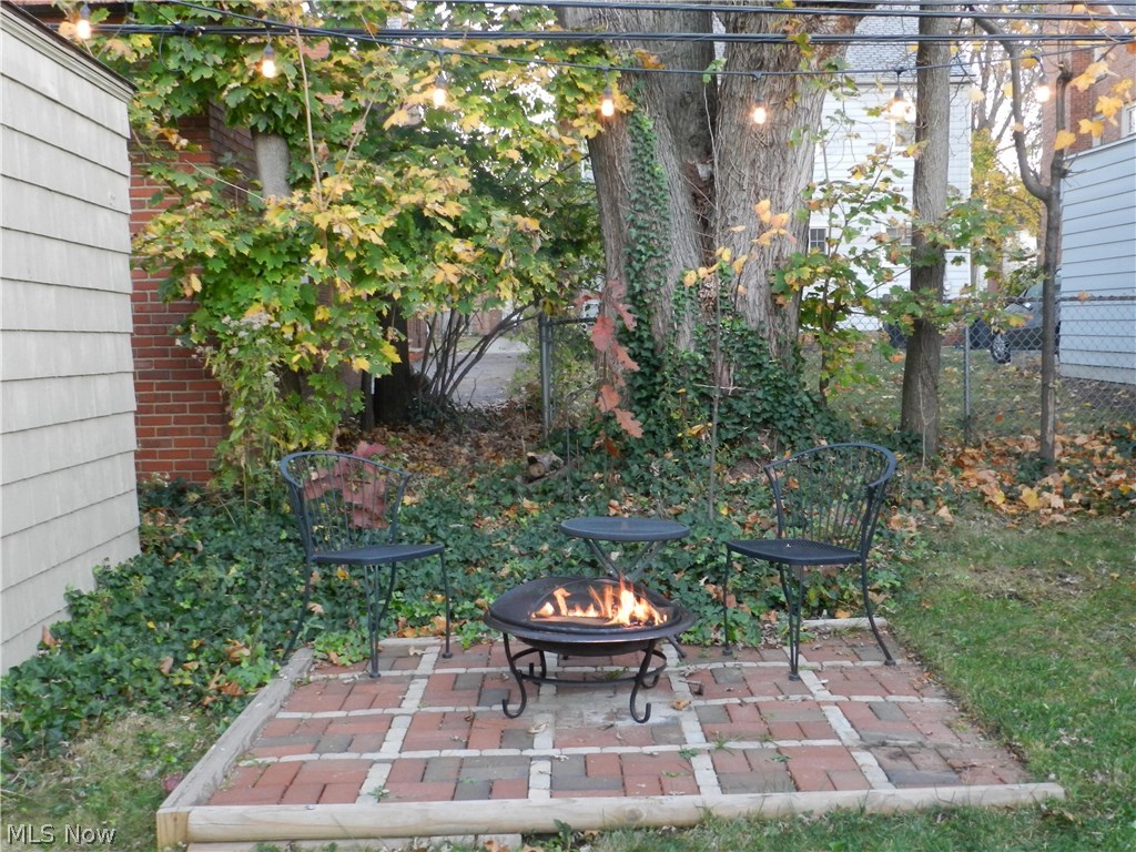 3693 Gridley Road Shaker Heights, OH 44122 - Photo 19 of 22 Professionally Landscaped. Paver Patio and Cozy Fire Pit in the Backyard
