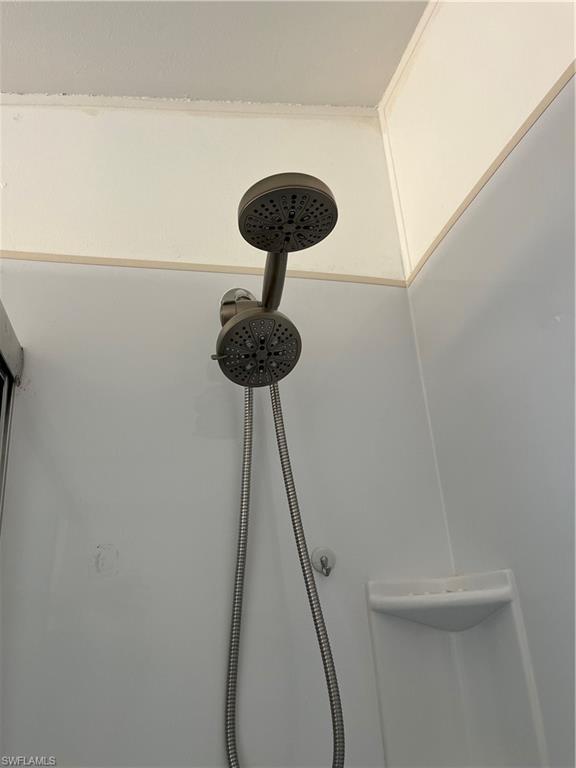 53 Oceans Boulevard, Unit 53 Naples, FL 34104 - Photo 21 of 42 a close up of a shower in a room