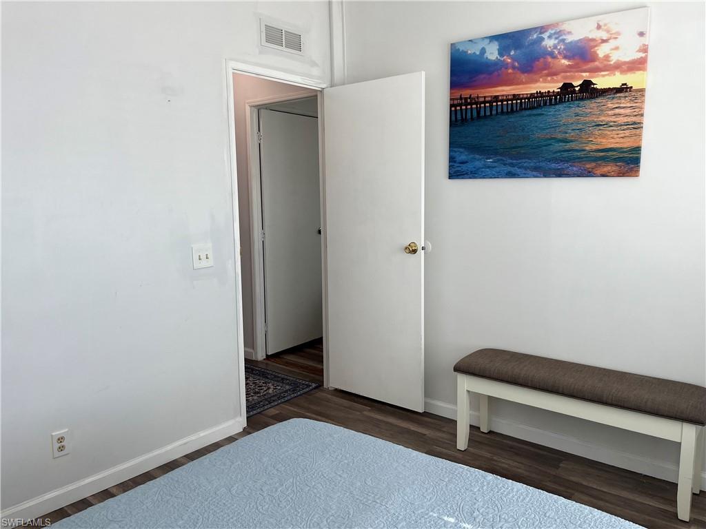 53 Oceans Boulevard, Unit 53 Naples, FL 34104 - Photo 23 of 42 a view of a room with a bench