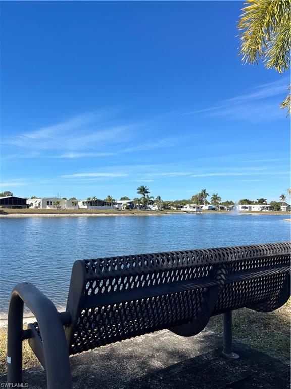 53 Oceans Boulevard, Unit 53 Naples, FL 34104 - Photo 32 of 42 a terrace of a lake view
