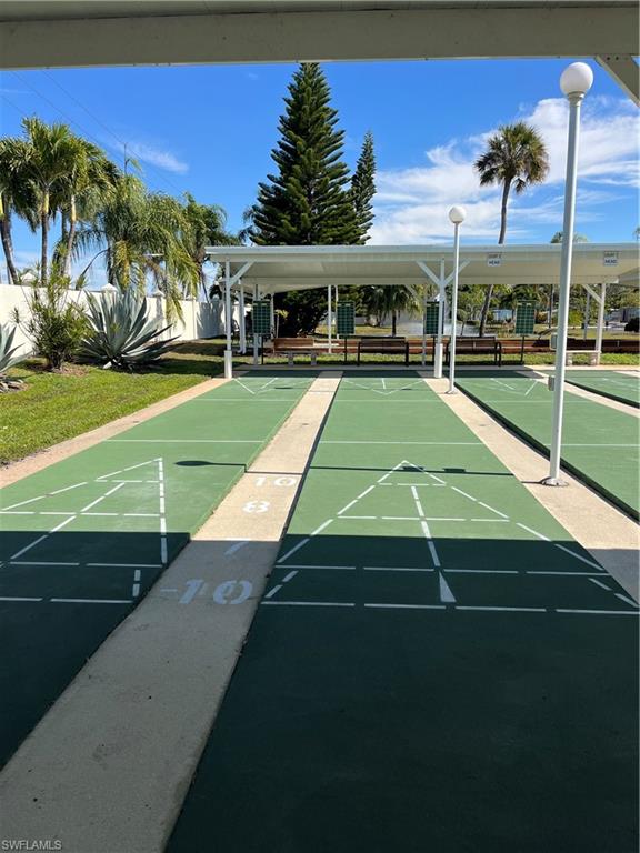 53 Oceans Boulevard, Unit 53 Naples, FL 34104 - Photo 34 of 42 a view of outdoor space with seating area