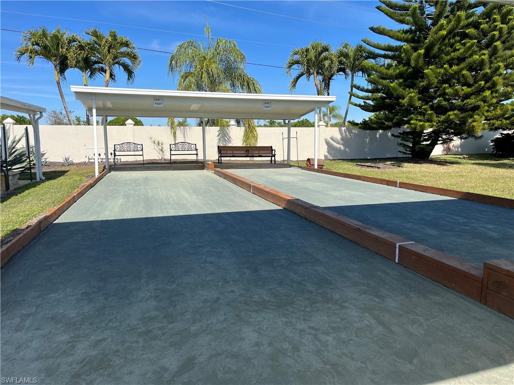 53 Oceans Boulevard, Unit 53 Naples, FL 34104 - Photo 35 of 42 a view of outdoor space with swimming pool