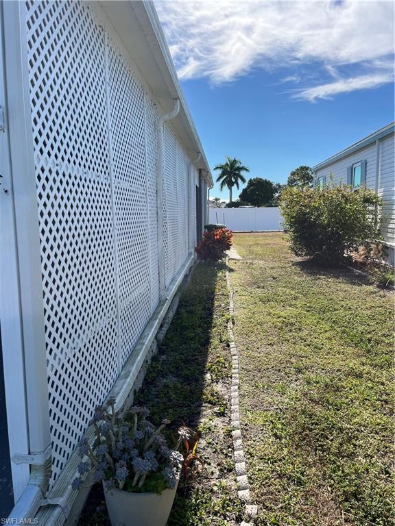 53 Oceans Boulevard, Unit 53 Naples, FL 34104 - Photo 5 of 42 a view of a backyard