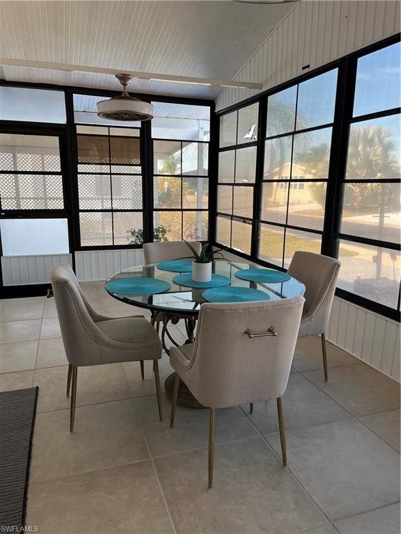 53 Oceans Boulevard, Unit 53 Naples, FL 34104 - Photo 9 of 42 a dining room with furniture and window
