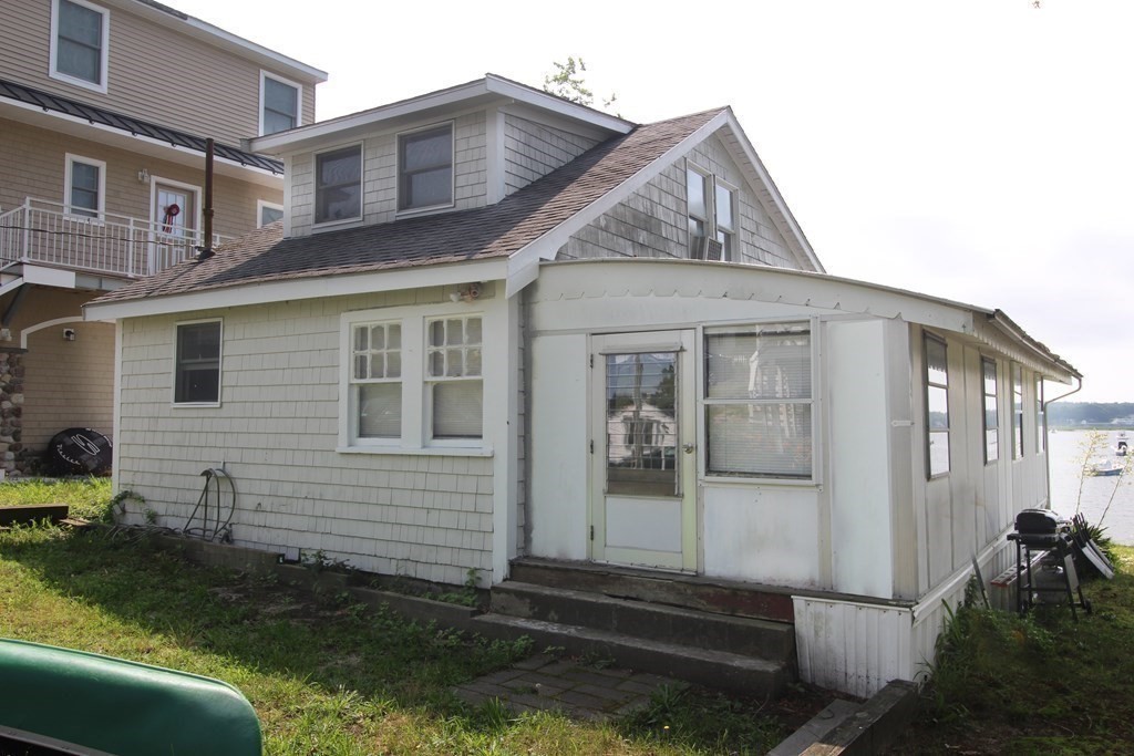 12 B Barnacle Road Wareham, MA 02571 - Photo 14 of 14 a view of a house with backyard and sitting area