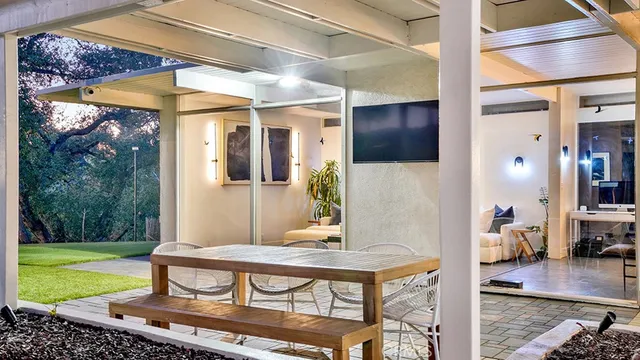 swimming pool view with outdoor seating