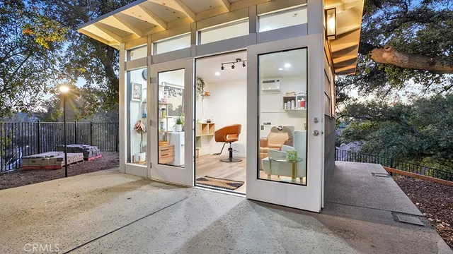 a view of a garden with sitting area