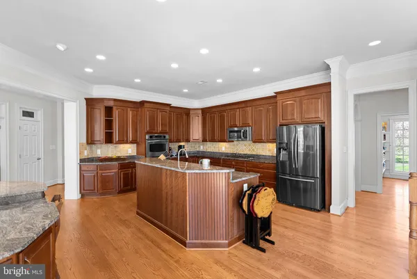 a kitchen with sink and window