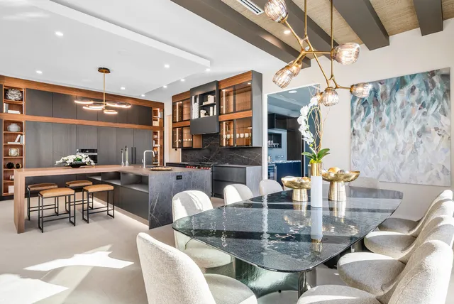 a living room with fireplace furniture and a wooden floor