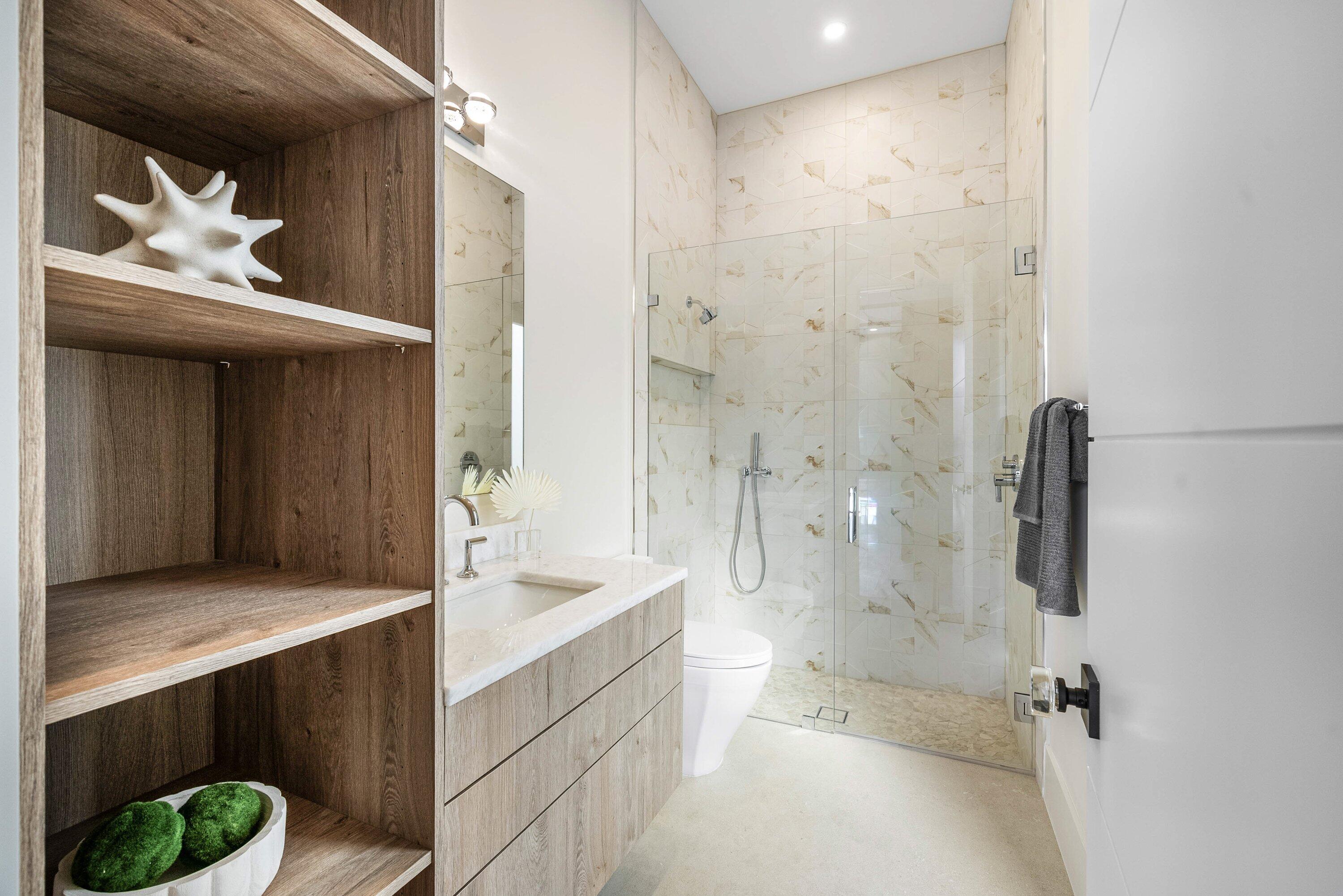 728 Enfield Street Boca Raton, FL 33487 - Photo 17 of 50 a bathroom with a double vanity sink toilet and shower