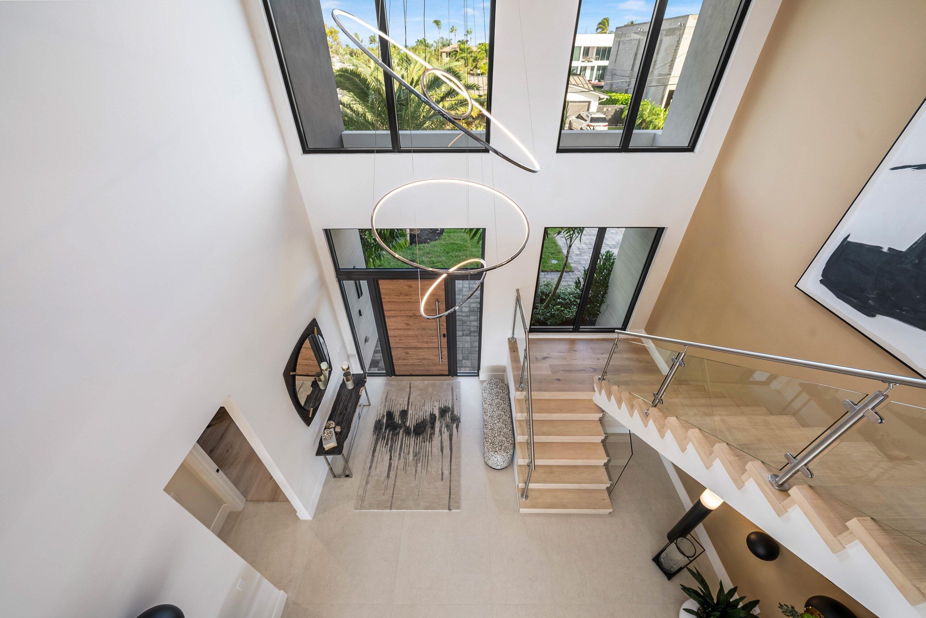 728 Enfield Street Boca Raton, FL 33487 - Photo 25 of 50 a view of entryway and hall with wooden floor