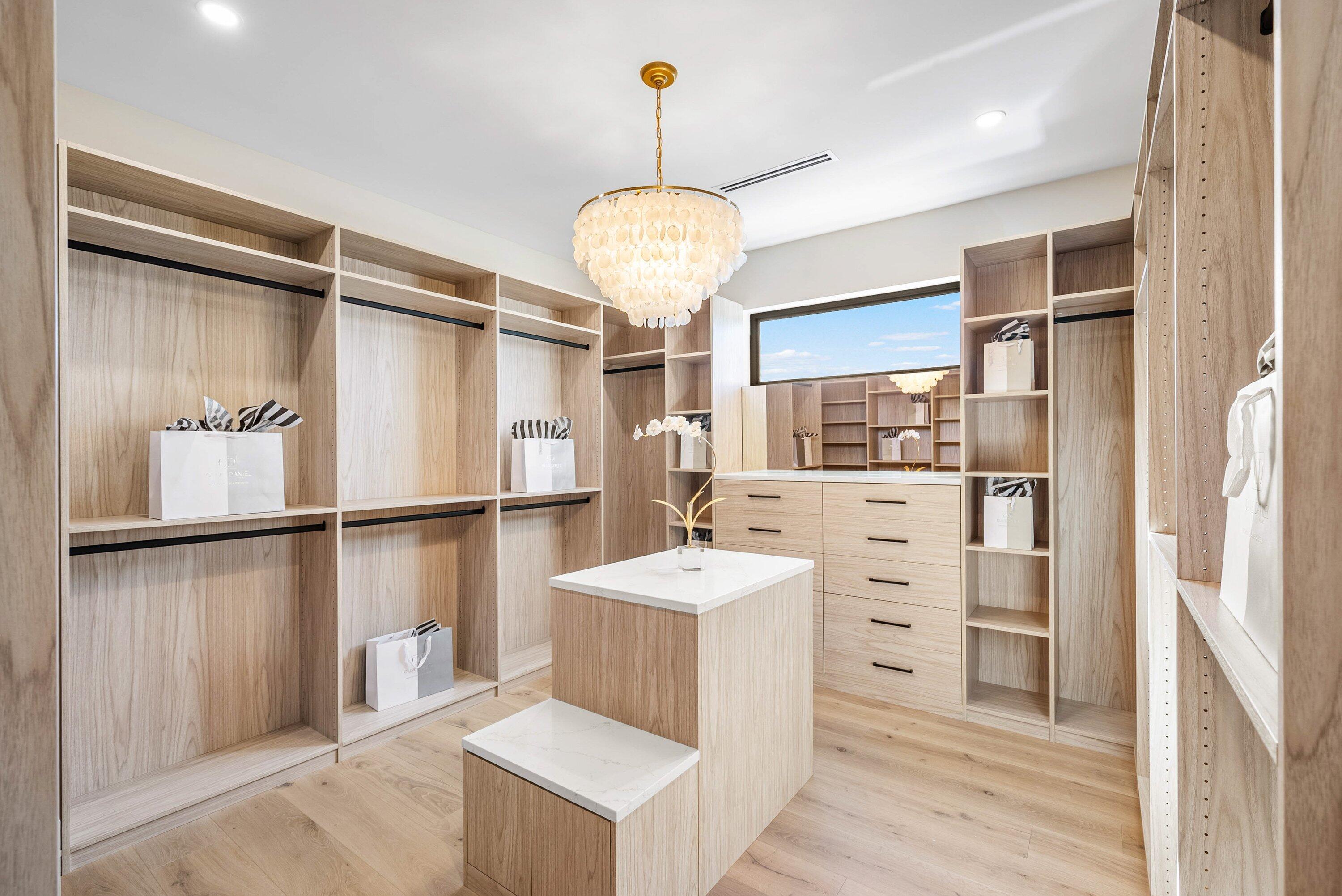 728 Enfield Street Boca Raton, FL 33487 - Photo 28 of 50 a room with a chandelier furniture and a window