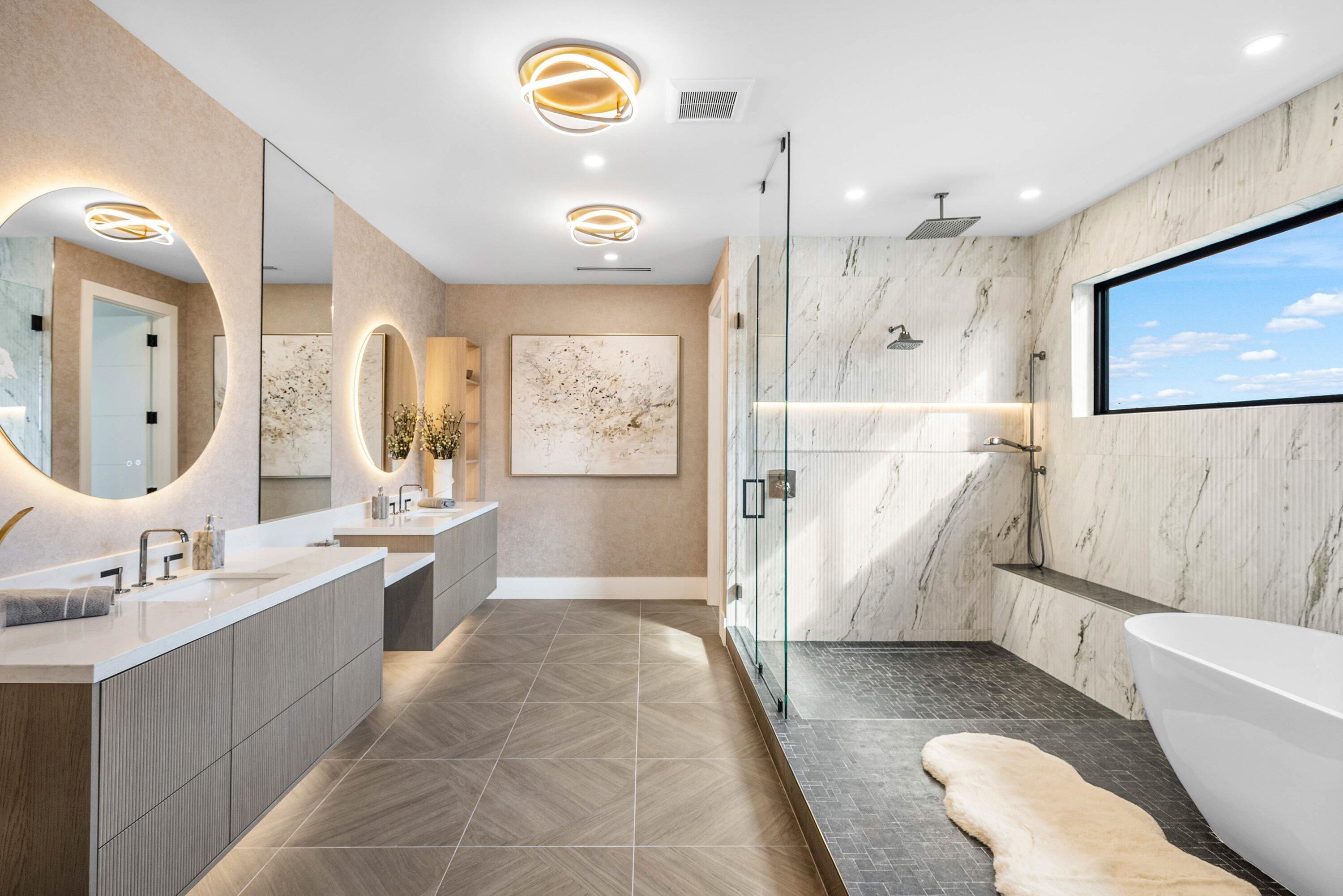 728 Enfield Street Boca Raton, FL 33487 - Photo 30 of 50 a bathroom with a tub a sink and mirror