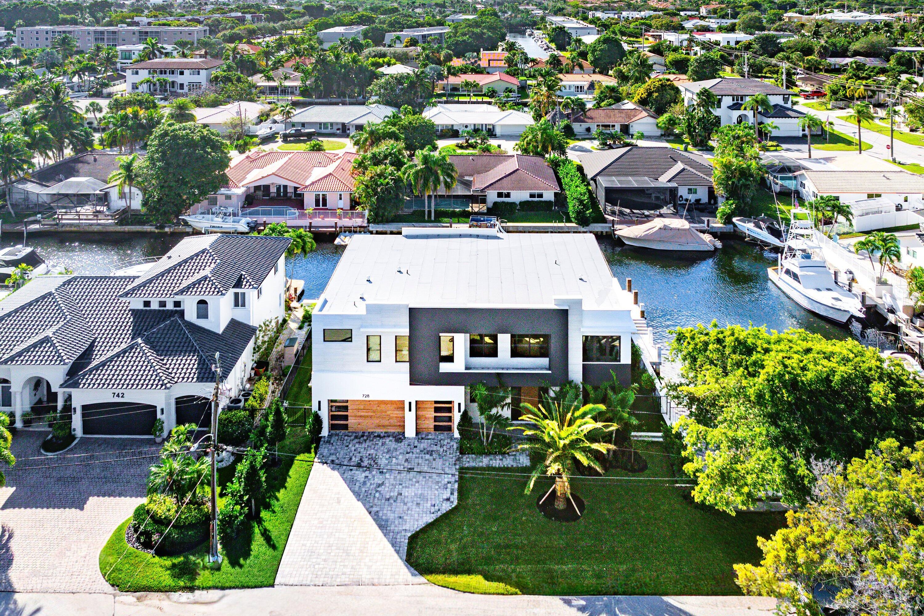 728 Enfield Street Boca Raton, FL 33487 - Photo 45 of 50 an aerial view of a house with garden space and street view