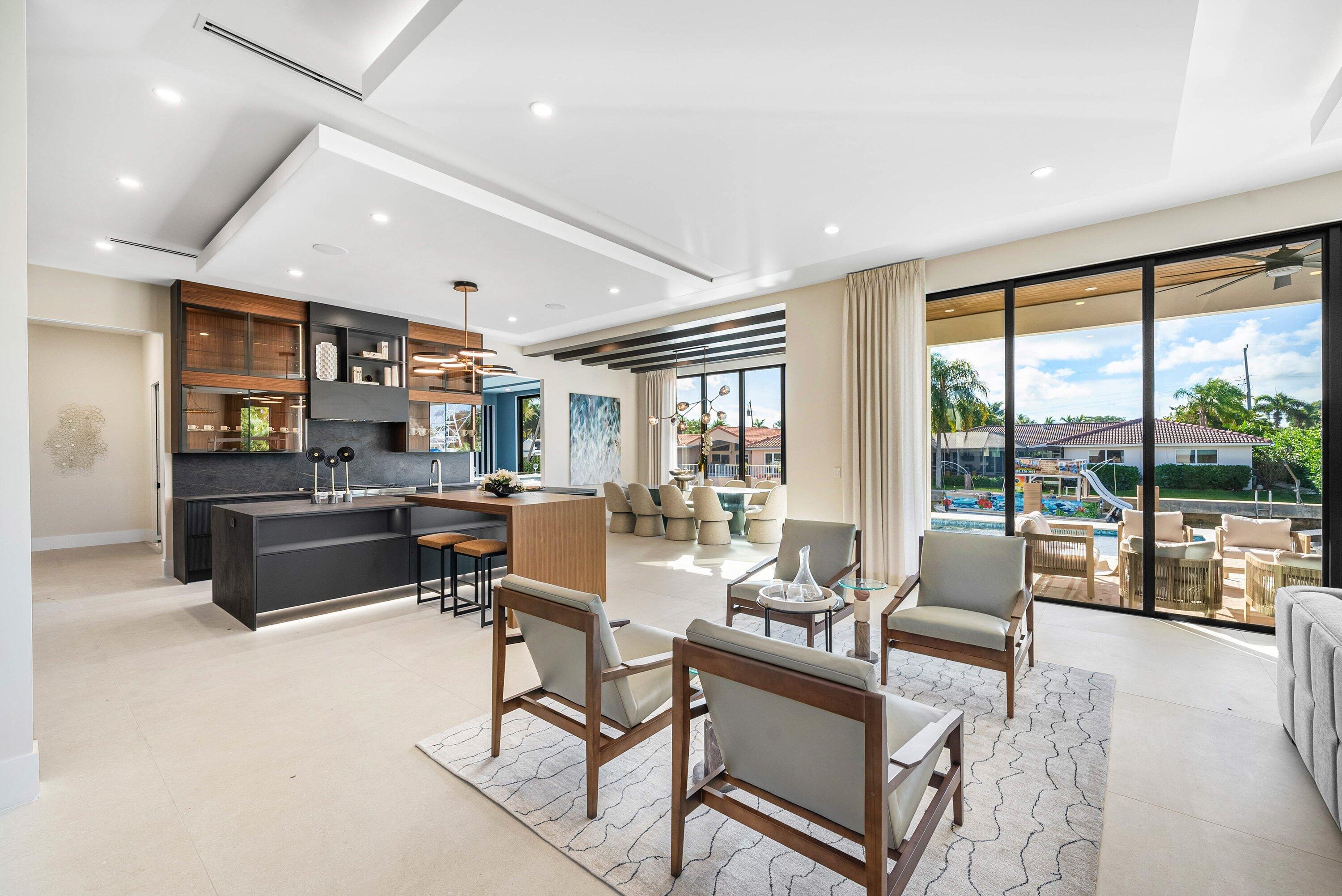 728 Enfield Street Boca Raton, FL 33487 - Photo 6 of 50 a living room with furniture and a large window