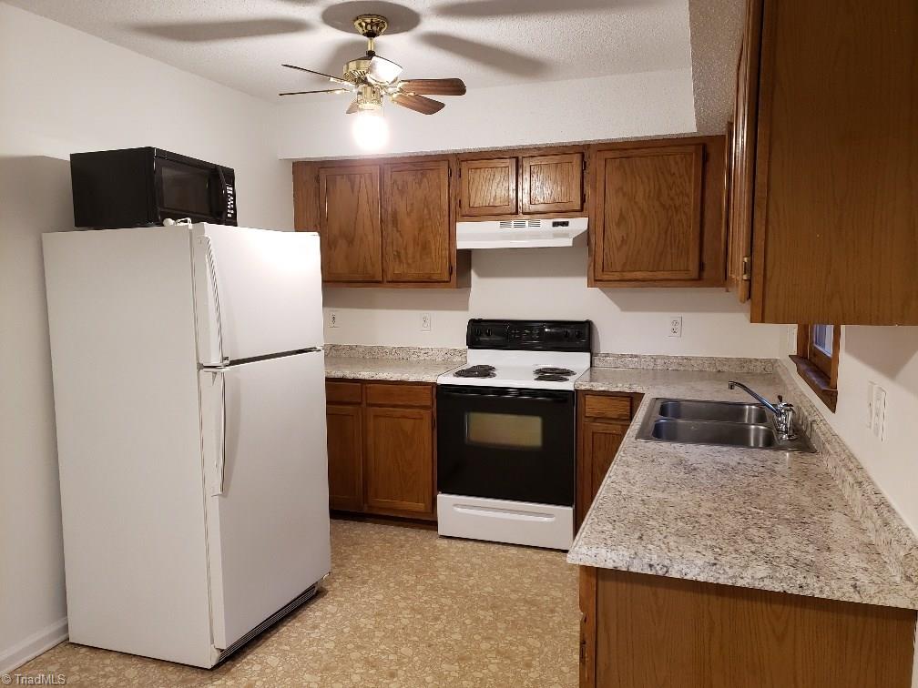 204 Beckner Road Lexington, NC 27292 - Photo 7 of 15 Refrigerator and microwave stay.