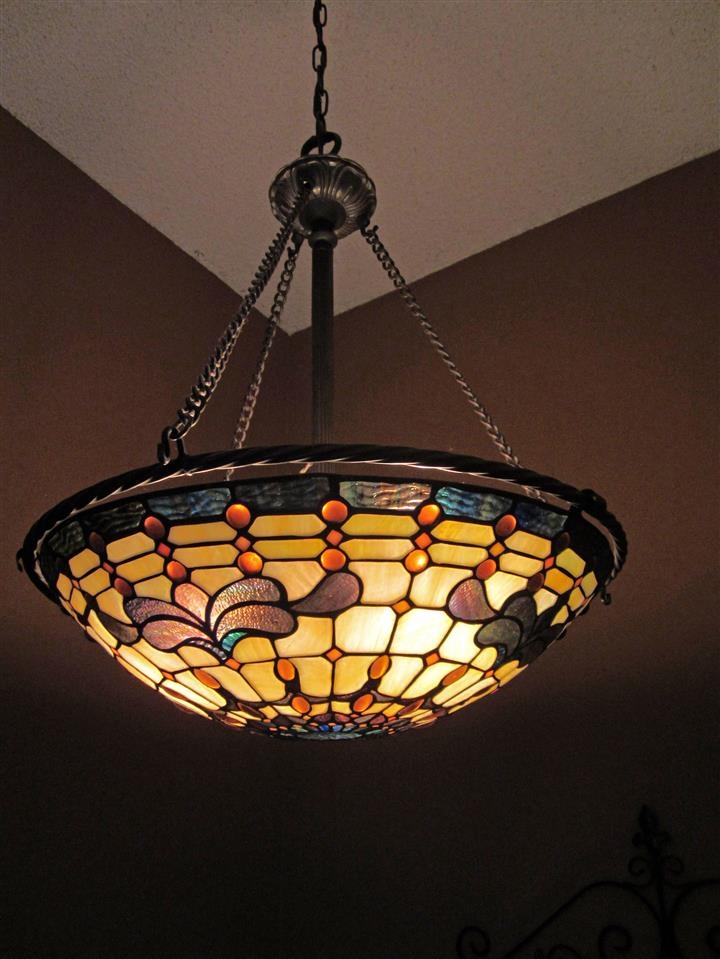 17547 Matinal Road San Diego, CA 92127 - Photo 15 of 23 Stained glass light fixture in staircase conveys.