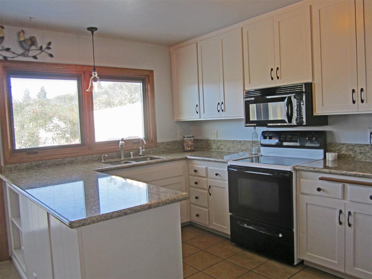 17547 Matinal Road San Diego, CA 92127 - Photo 3 of 23 Kitchen features granite counters and back splash. Stainless sink with water filtration and views.