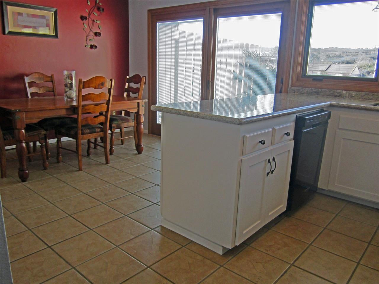 17547 Matinal Road San Diego, CA 92127 - Photo 4 of 23 Kitchen opens to dining room and back patio which is great for entertaining.