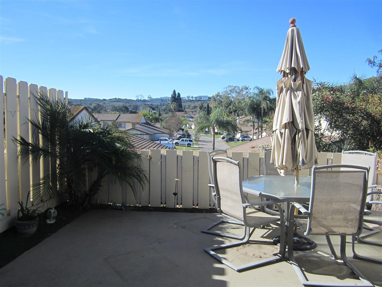 17547 Matinal Road San Diego, CA 92127 - Photo 6 of 23 Back patio features great views of the surrounding greenbelt and hills. Patio is large enough for outdoor grill and big table. Fully fenced.