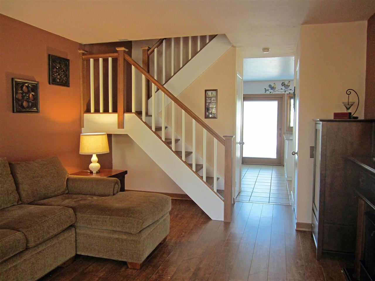 17547 Matinal Road San Diego, CA 92127 - Photo 8 of 23 The stairs feature oak treads and a freshly painted railing which keeps the area looking bright.