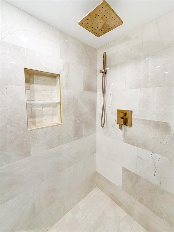 4800 Bayview Drive, Unit 503 Fort Lauderdale, FL 33308 - Photo 14 of 30 a bathroom with a bathtub and shower