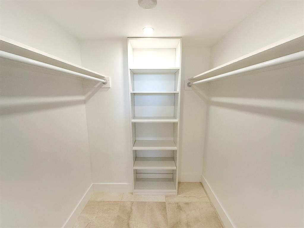 4800 Bayview Drive, Unit 503 Fort Lauderdale, FL 33308 - Photo 19 of 30 a view of an empty walk in closet