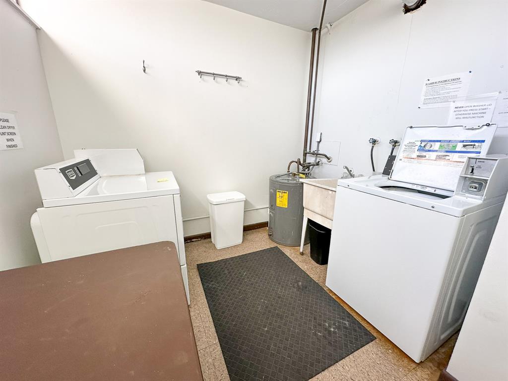 4800 Bayview Drive, Unit 503 Fort Lauderdale, FL 33308 - Photo 28 of 30 a utility room with dryer and washer