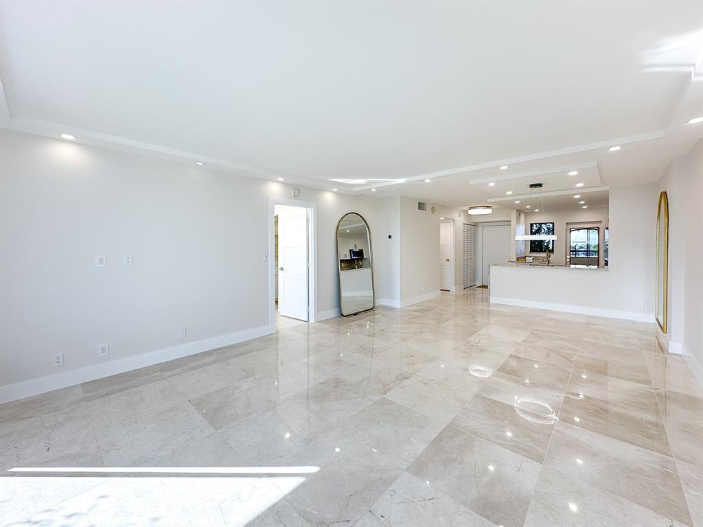 4800 Bayview Drive, Unit 503 Fort Lauderdale, FL 33308 - Photo 8 of 30 a view of a big room with a fireplace